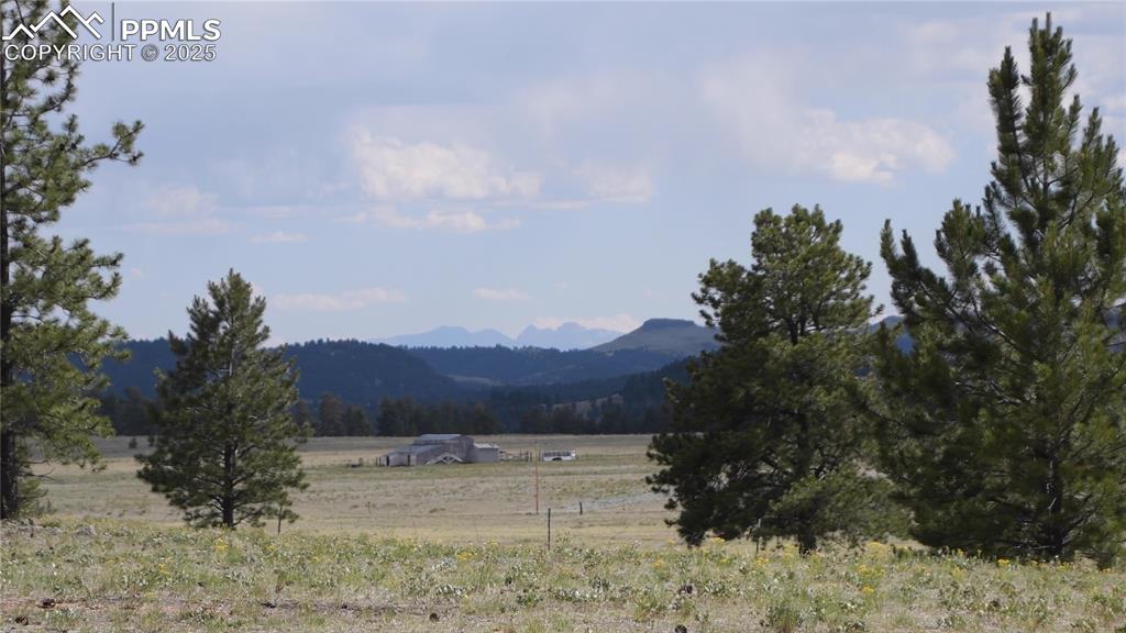 Image 35 of 40: Mountain view with rural landscape