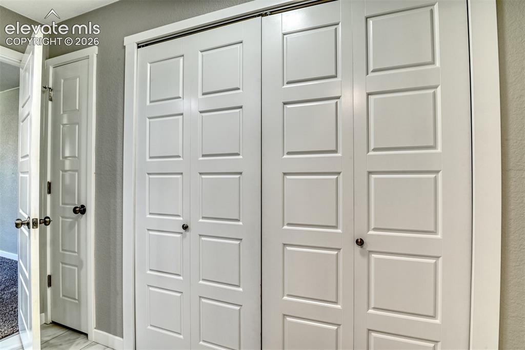 Image 20 of 33: Master bathroom closets (3).