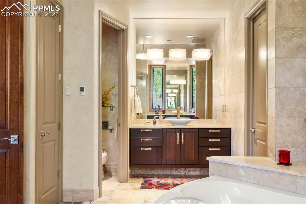 Image 27 of 50: Master Bathroom