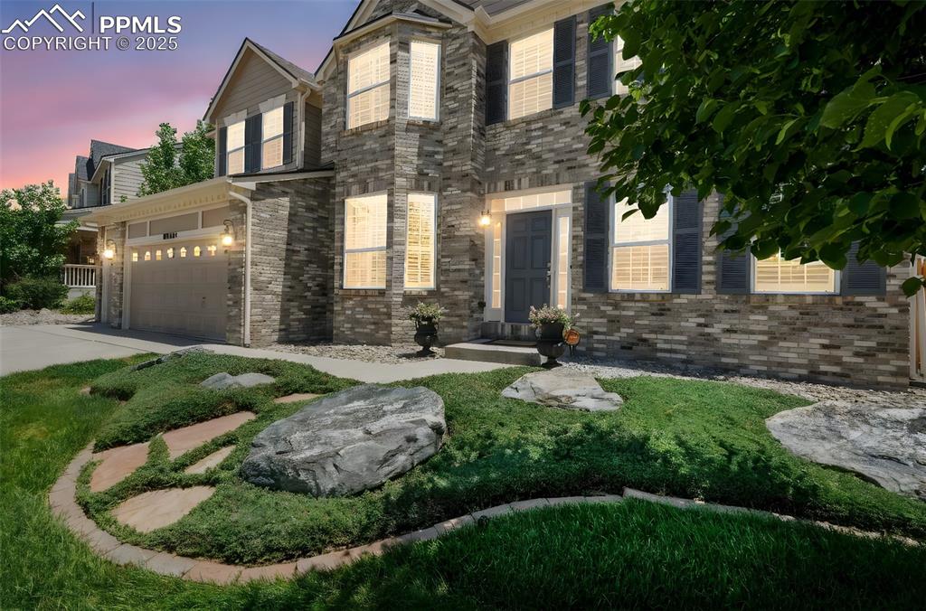 Image 49 of 50: Beautiful Front Landscaping