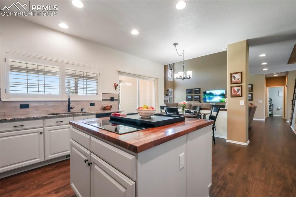 Image 9 of 50: Butcher Block On Island
