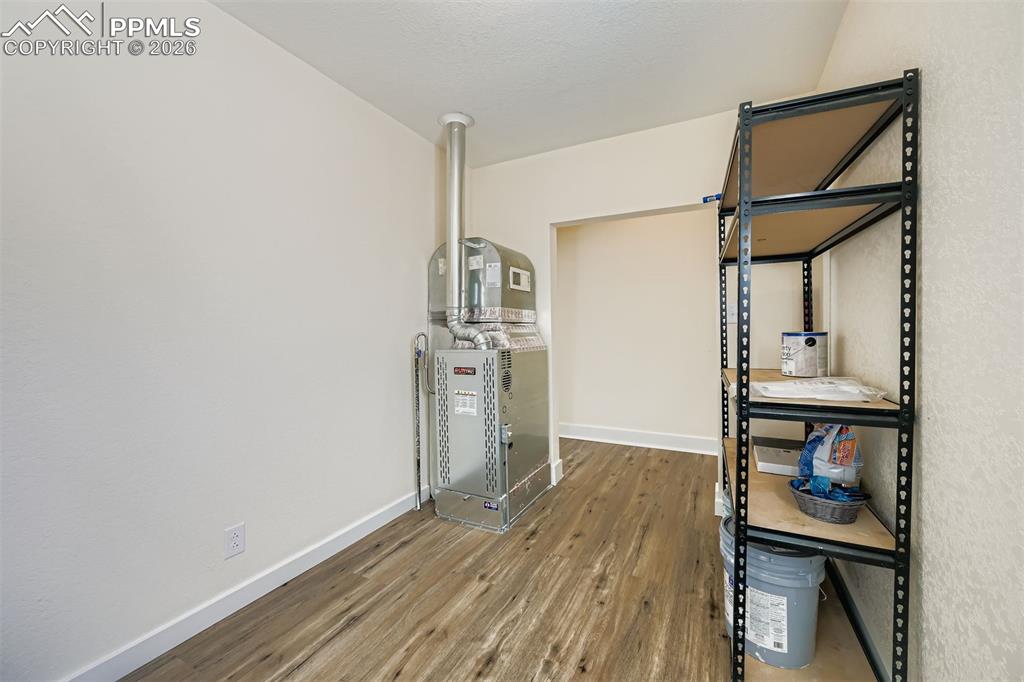 Image 31 of 38: Large storage area in the laundry room
