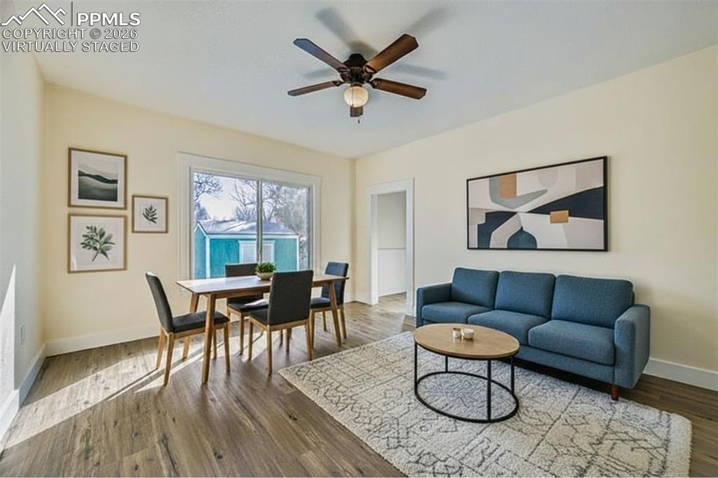 Image 9 of 38: virtually staged - Living & Dining area