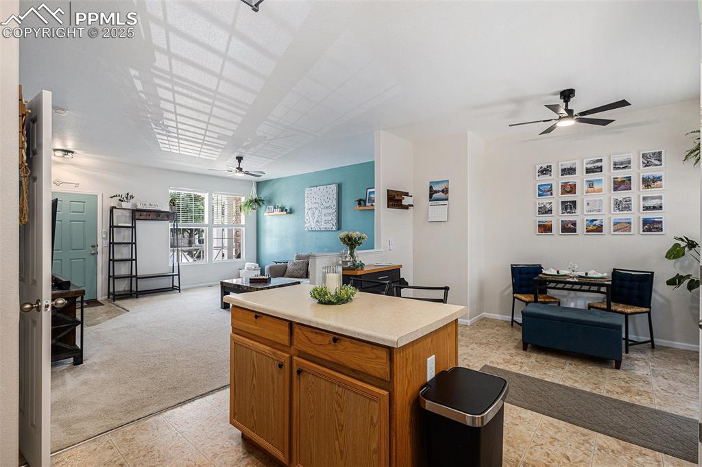 Image 10 of 24: updated lighting and ceiling fans