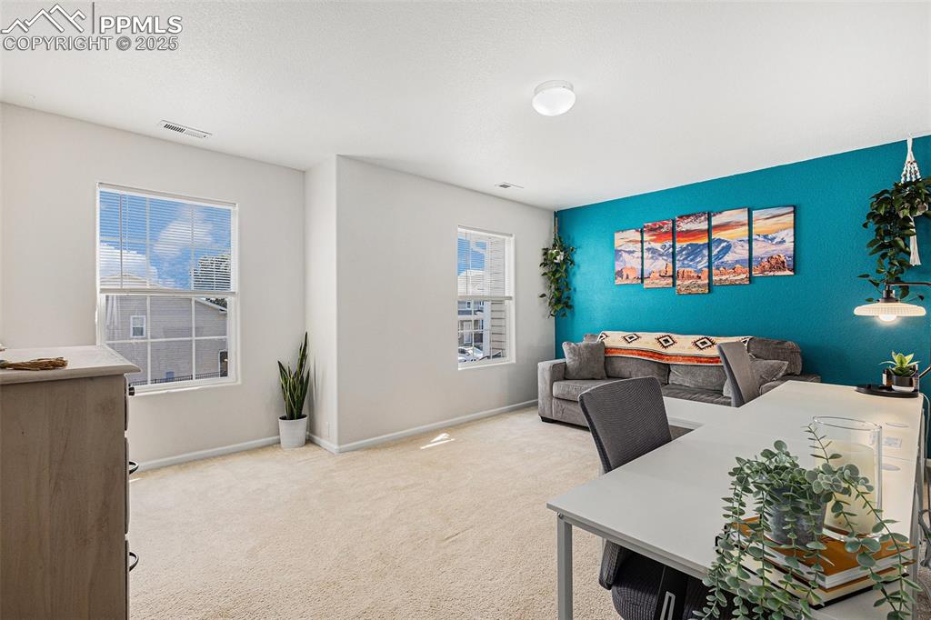 Image 17 of 24: Spacious bedroom with ensuite bathroom