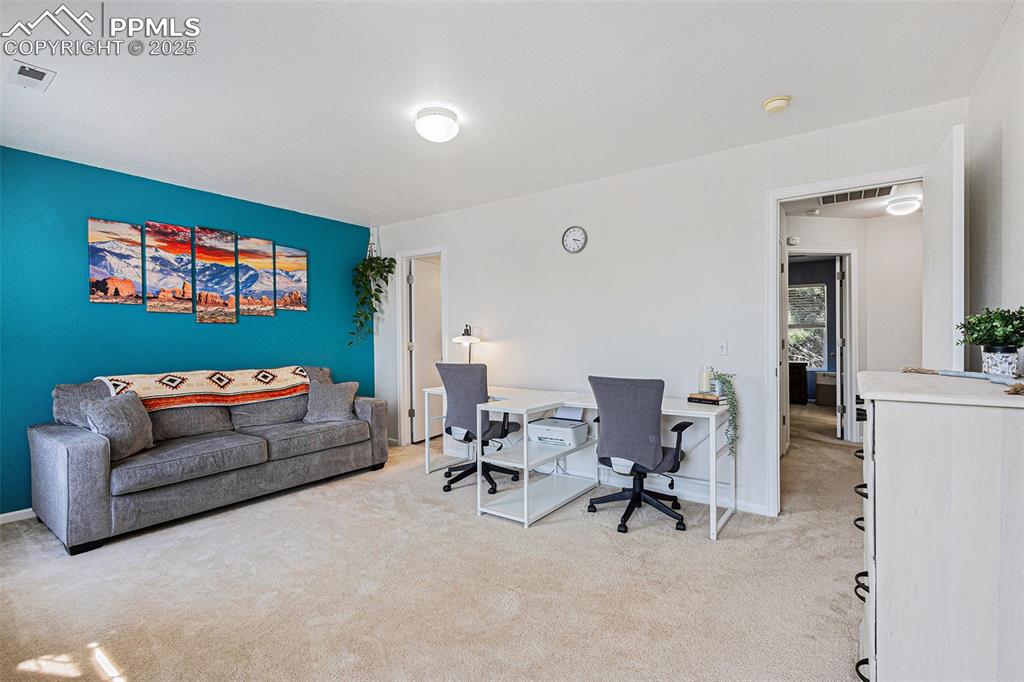 Image 18 of 24: Spacious bedroom with ensuite bathroom