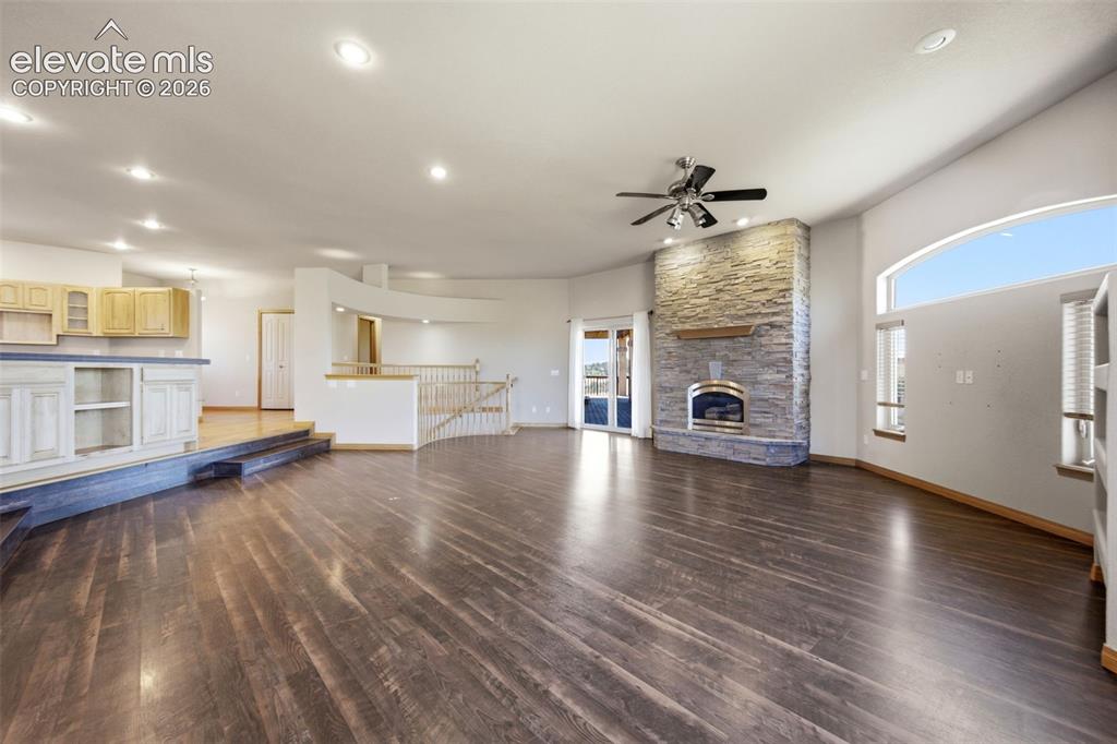 Image 10 of 39: Spacious Living Room with fireplace