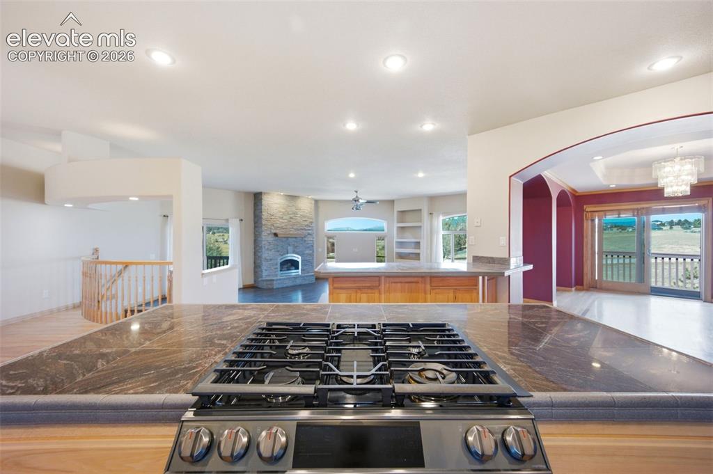 Image 16 of 39: View from Kitchen to Living Room