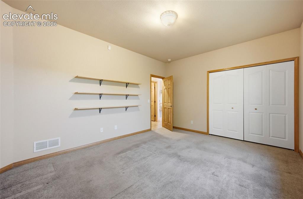 Image 23 of 39: One of 3 Main Level Bedrooms