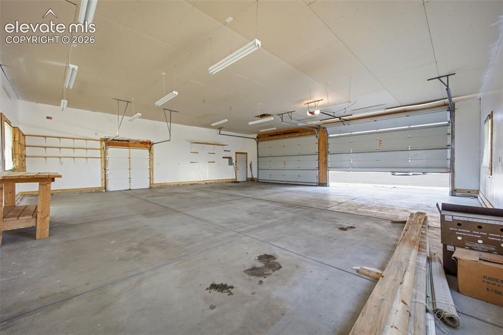 Image 33 of 39: Detached garage with room for up to 8 cars!