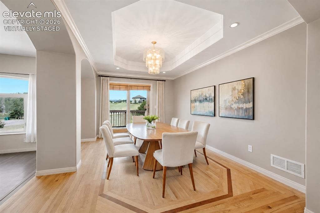 Image 4 of 39: Spacious Dining Room with walkout to deck (virtually staged)