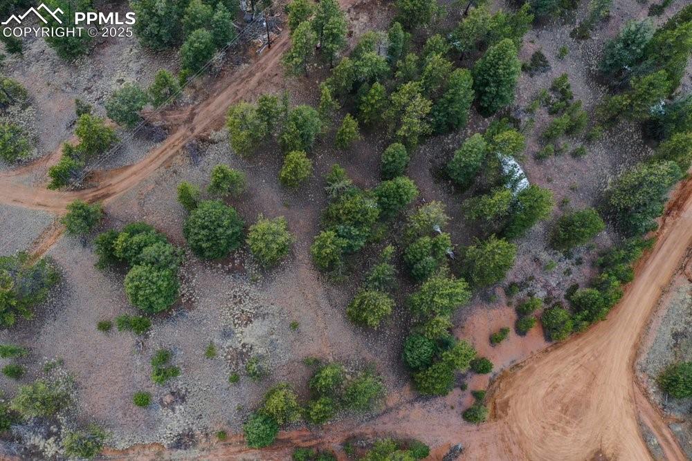 Image 20 of 34: Birds eye view of property with a rural view