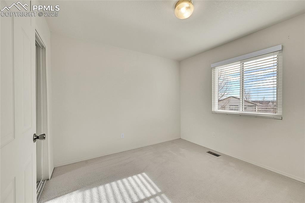 Image 24 of 39: Bedroom