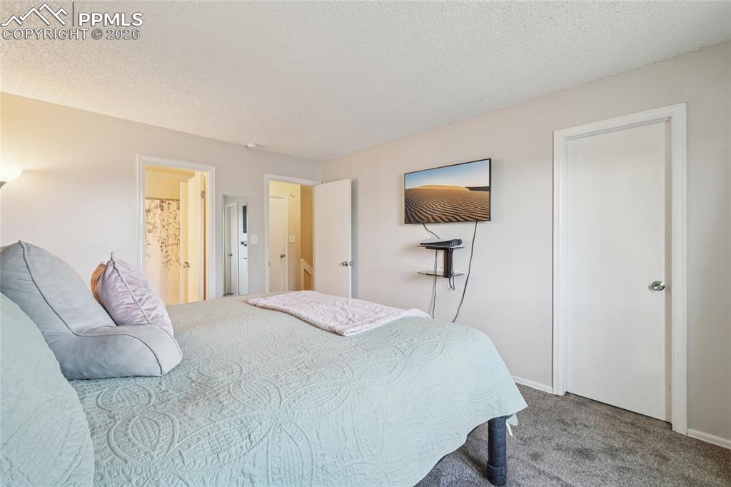 Image 13 of 23: Bedroom