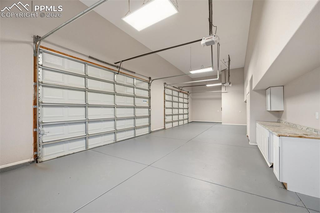 Image 35 of 50: The second garage that is fully finished with drywall and paint