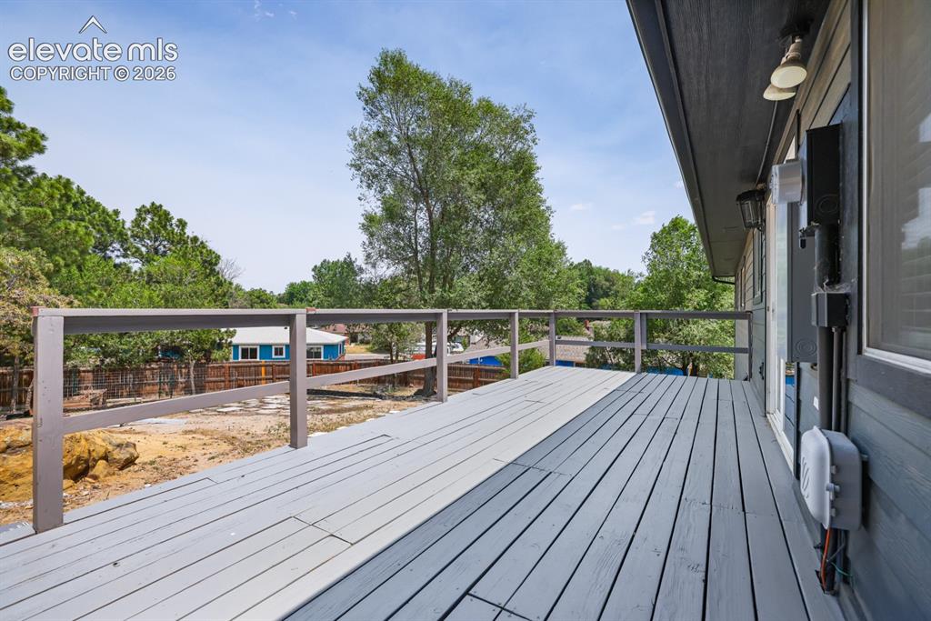 Image 18 of 49: Back Deck right off the kitchen.