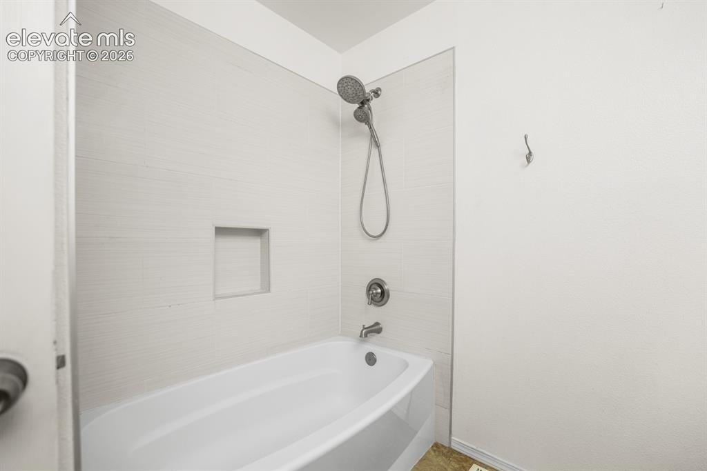 Image 29 of 49: second bathroom shower bathroom combo