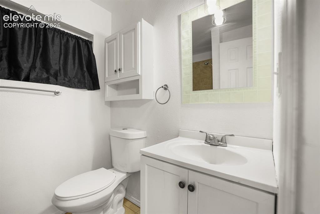 Image 42 of 49: Third bathroom on the Garden Level basement right around the corner from th