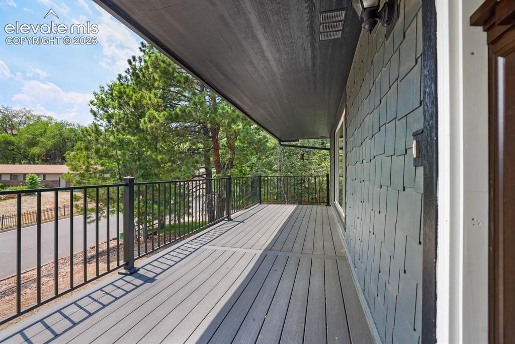Image 8 of 49: Front deck near the front Door 