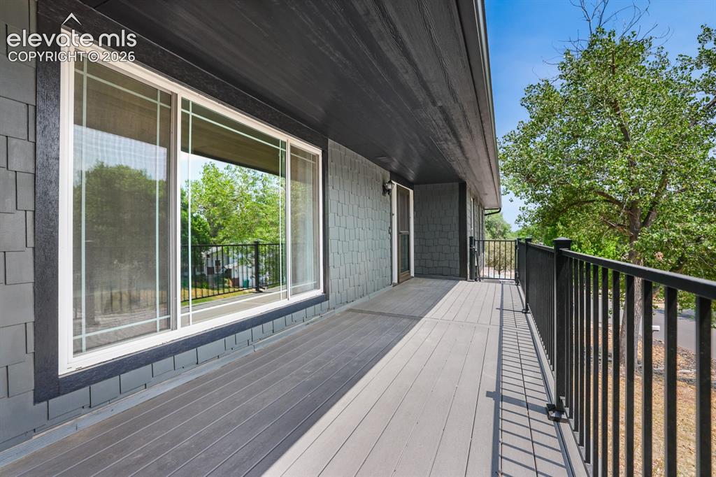 Image 9 of 49: Front deck opposite to give a idea of the size of this front deck,  The flo