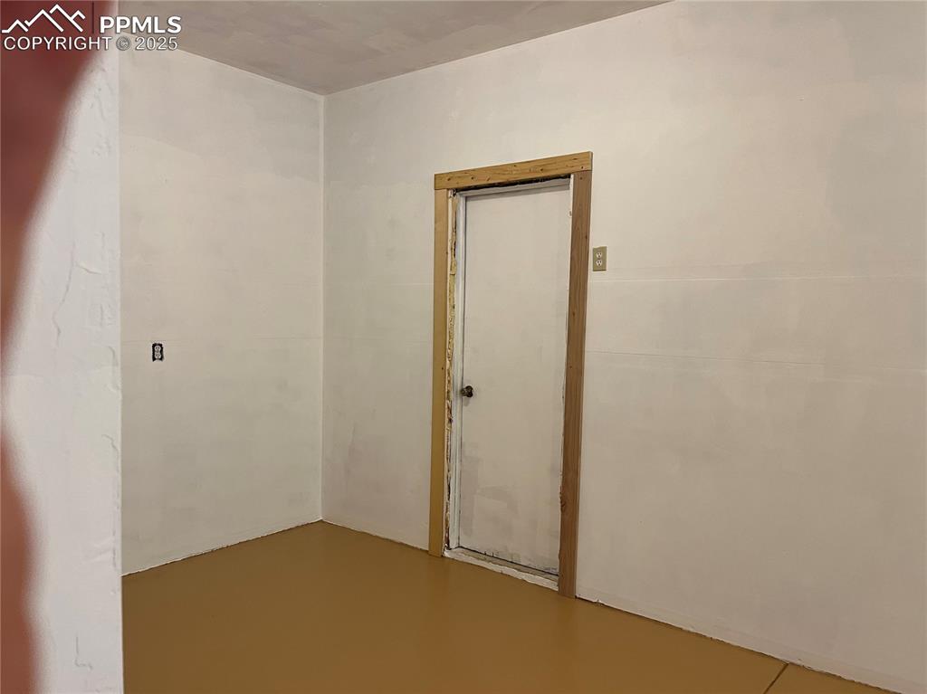 Image 2 of 10: 10 X 13  space has walk in doors from front and into garage out of office /