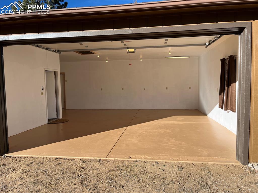 Image 6 of 10: All new paint even the floor!  GREAT area to store all that extra stuff?  T