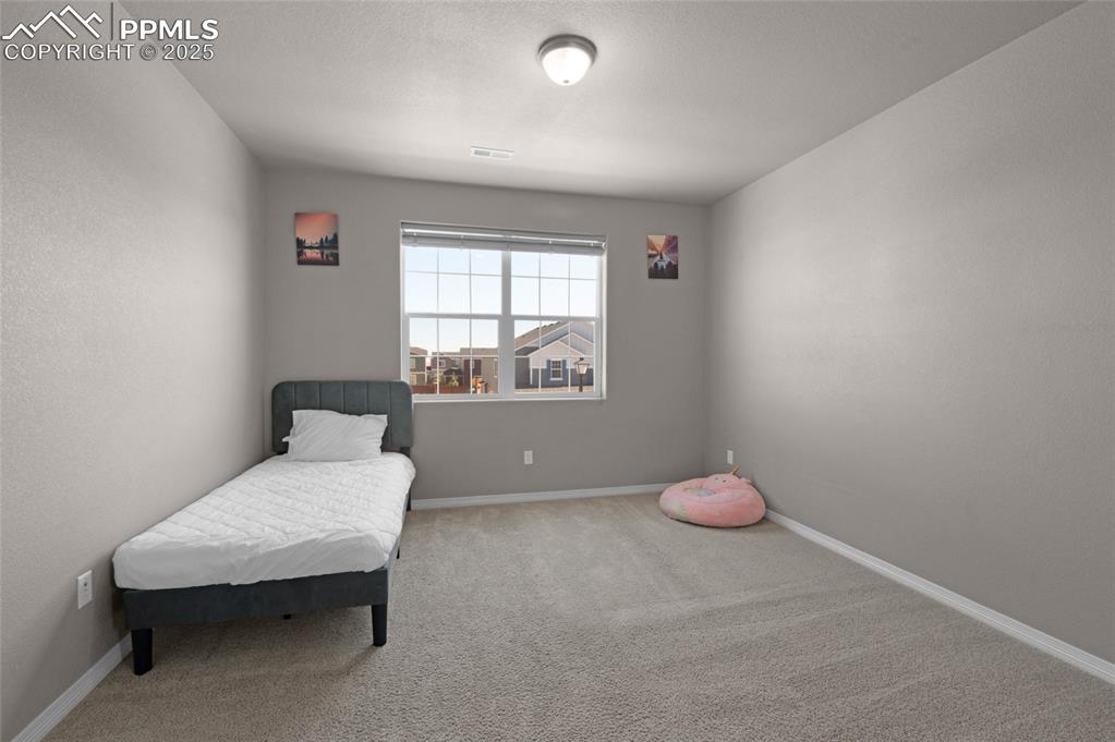 Image 21 of 35: Bedroom