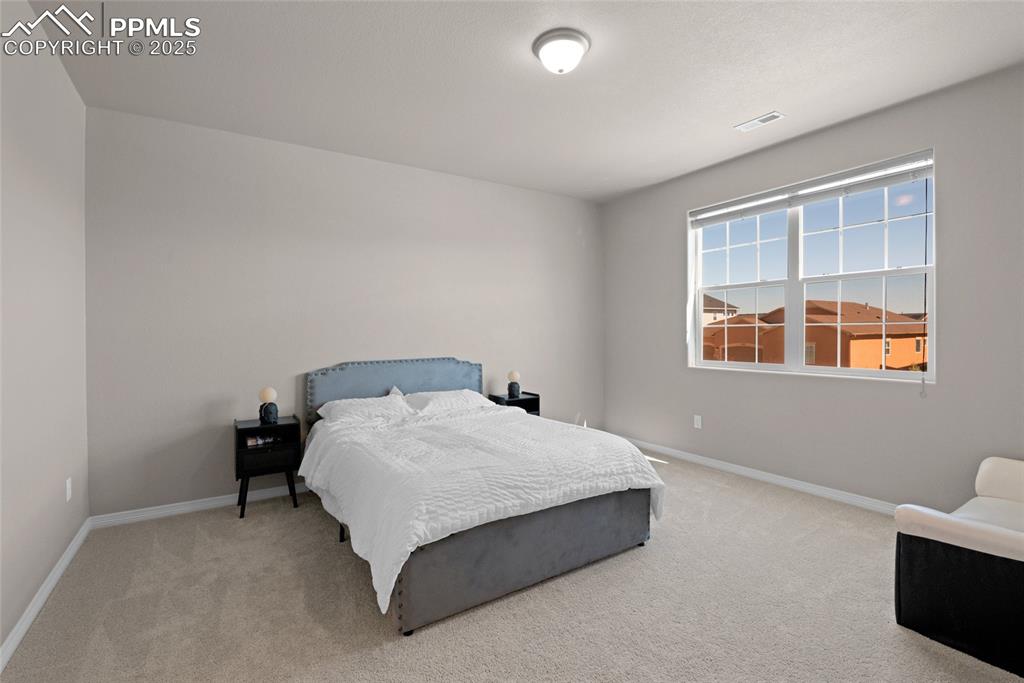 Image 23 of 35: Bedroom