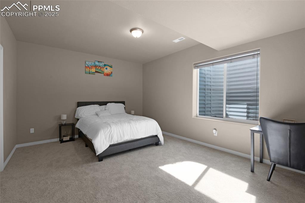 Image 27 of 35: Bedroom