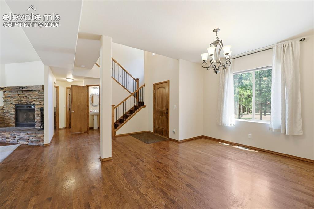 Image 14 of 50: Front Entry and Dining Room