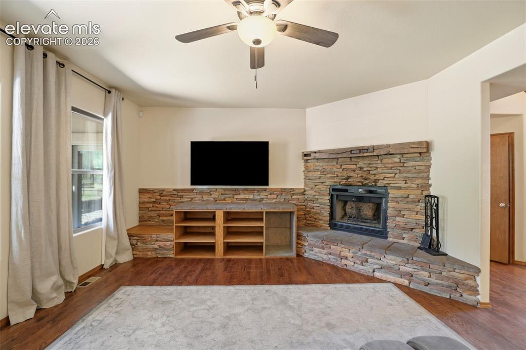 Image 15 of 50: w/ Wood Fireplace