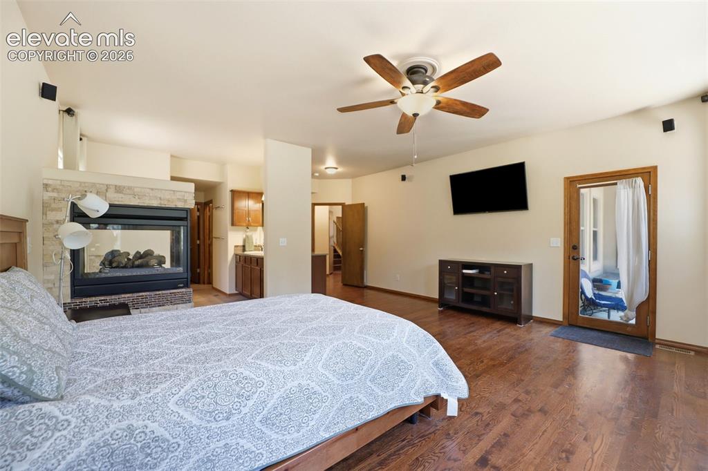 Image 24 of 50: w/ Gas Fireplace and Walkout