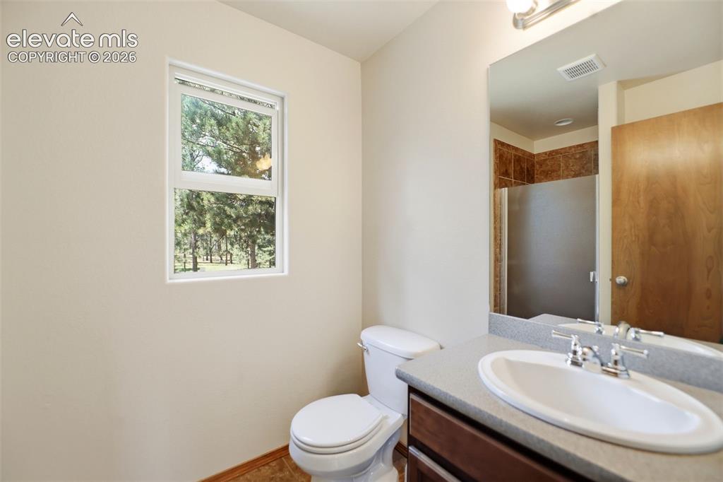 Image 34 of 50: En Suite Bathroom w/ Shower