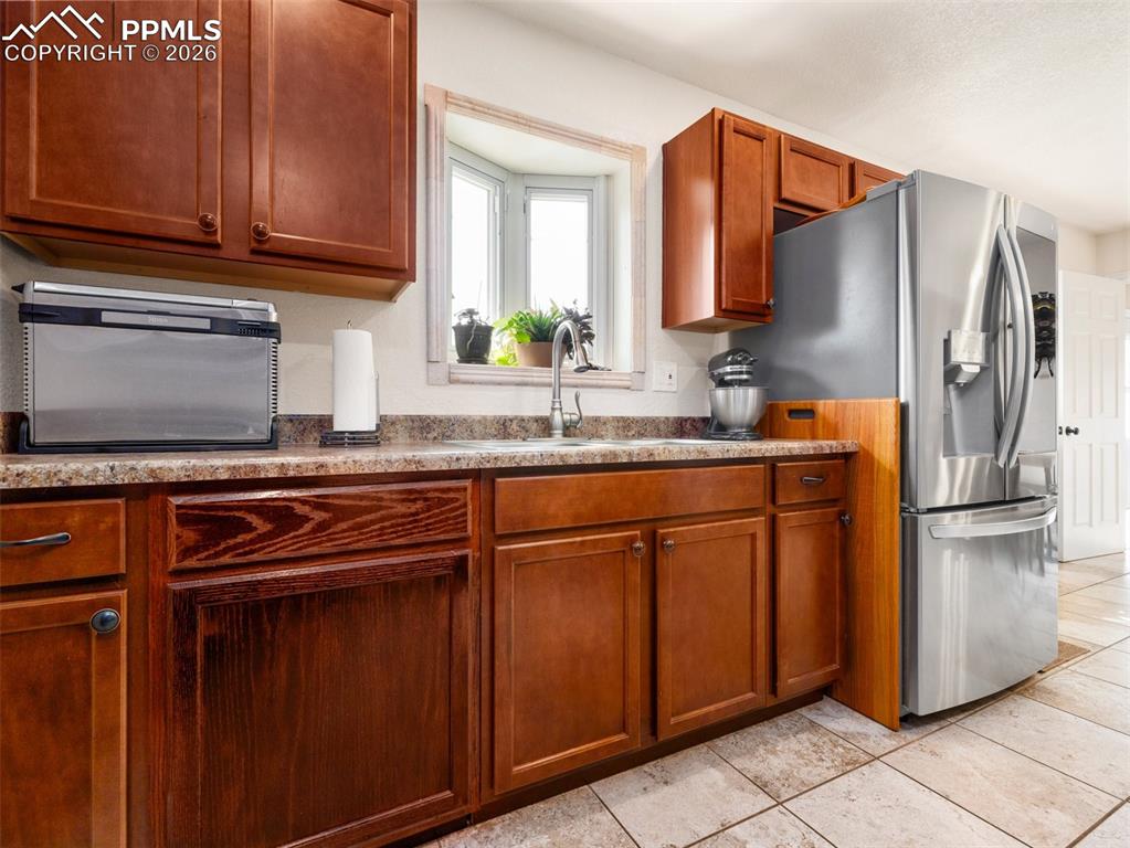 Image 13 of 50: Stainless steel dishwasher added to kitchen