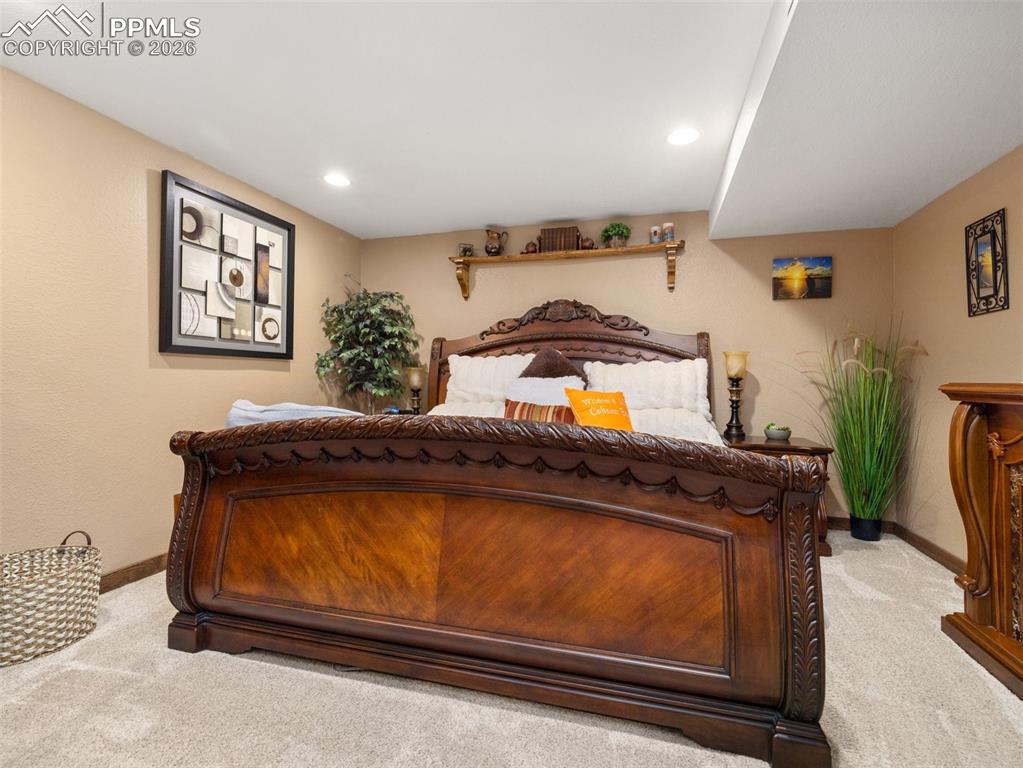 Image 24 of 50: Basement bedroom