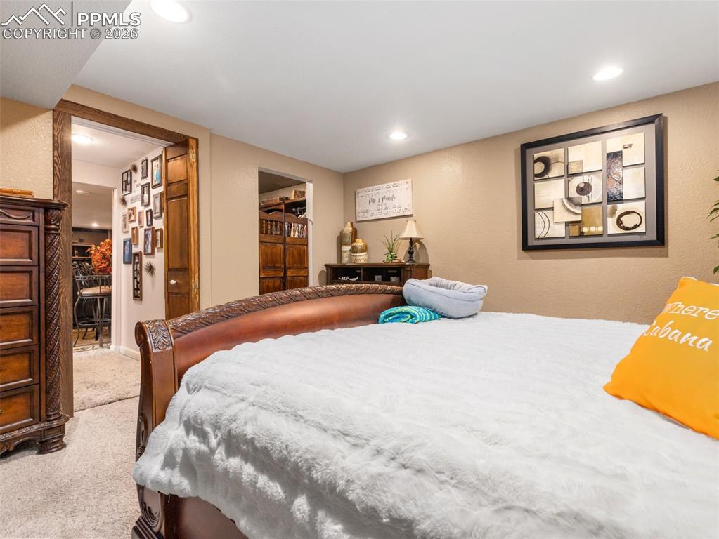 Image 25 of 50: Basement bedroom
