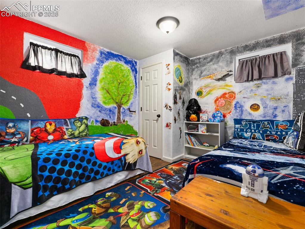 Image 26 of 50: Basement bedroom