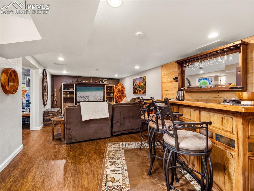 Image 27 of 50: Basement bar in family room