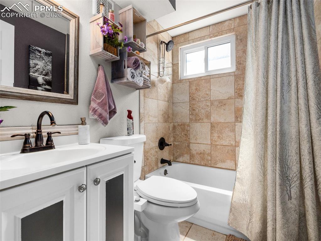 Image 31 of 50: Full bathroom in basement