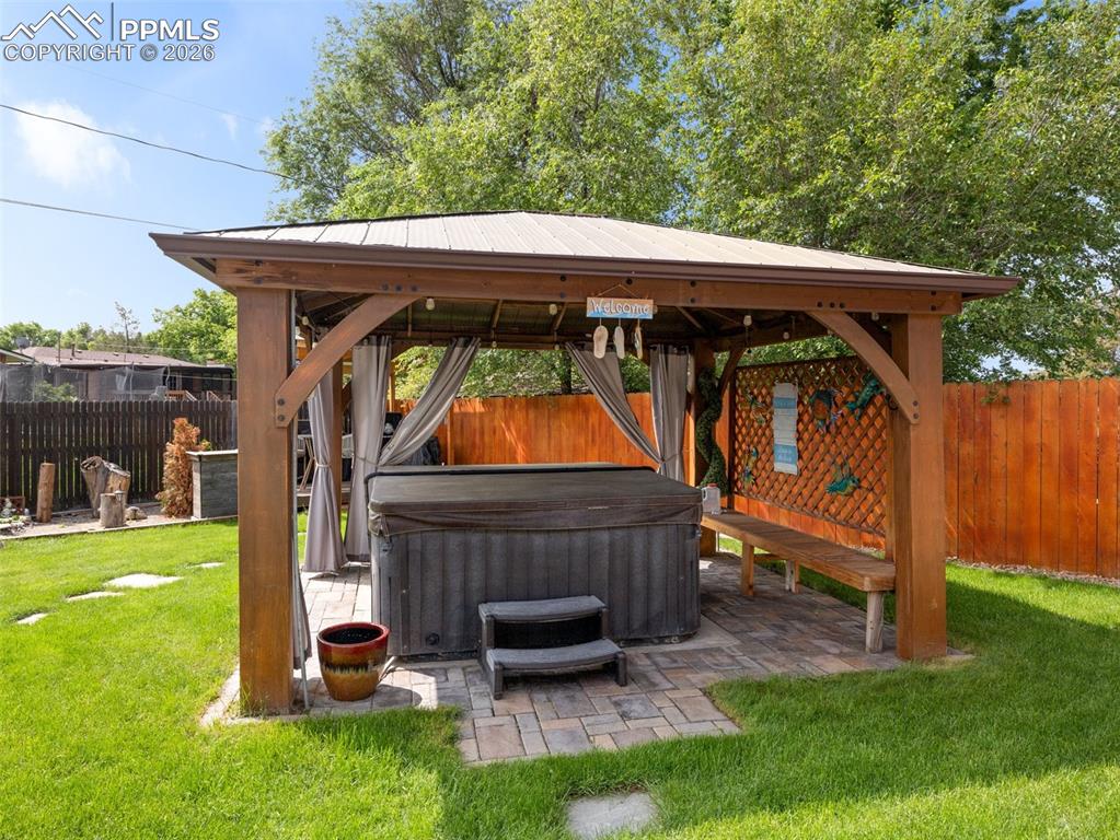 Image 34 of 50: Gazebo with power and hot tub