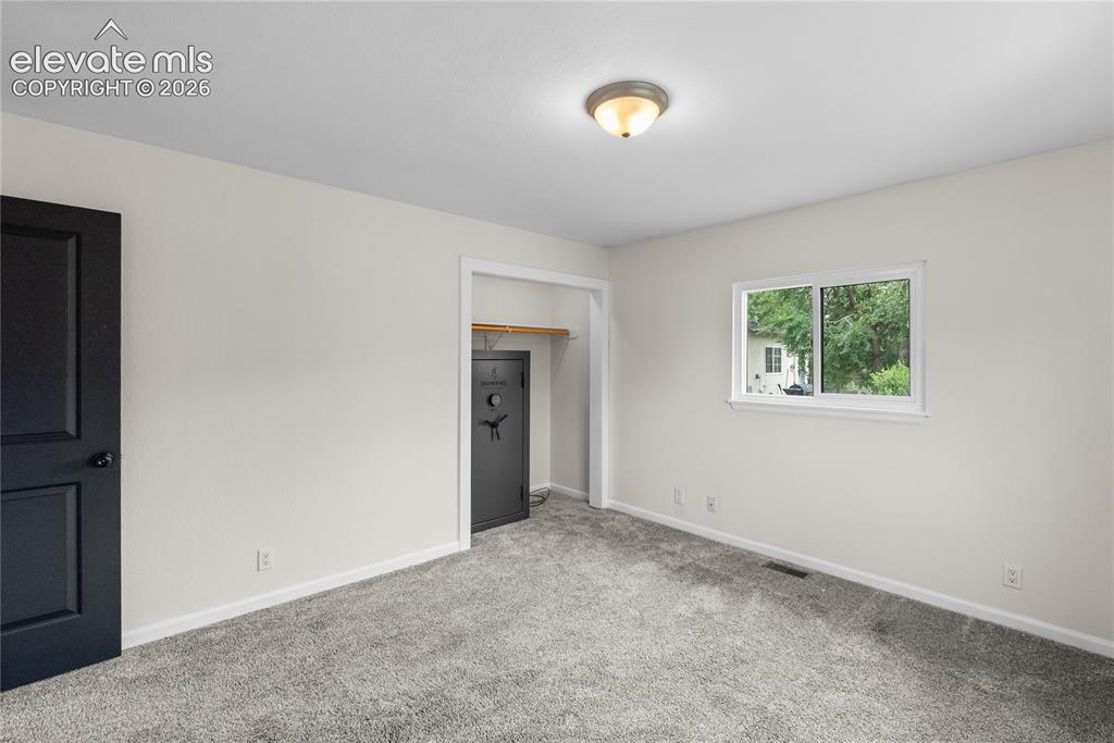 Image 12 of 21: Bedroom