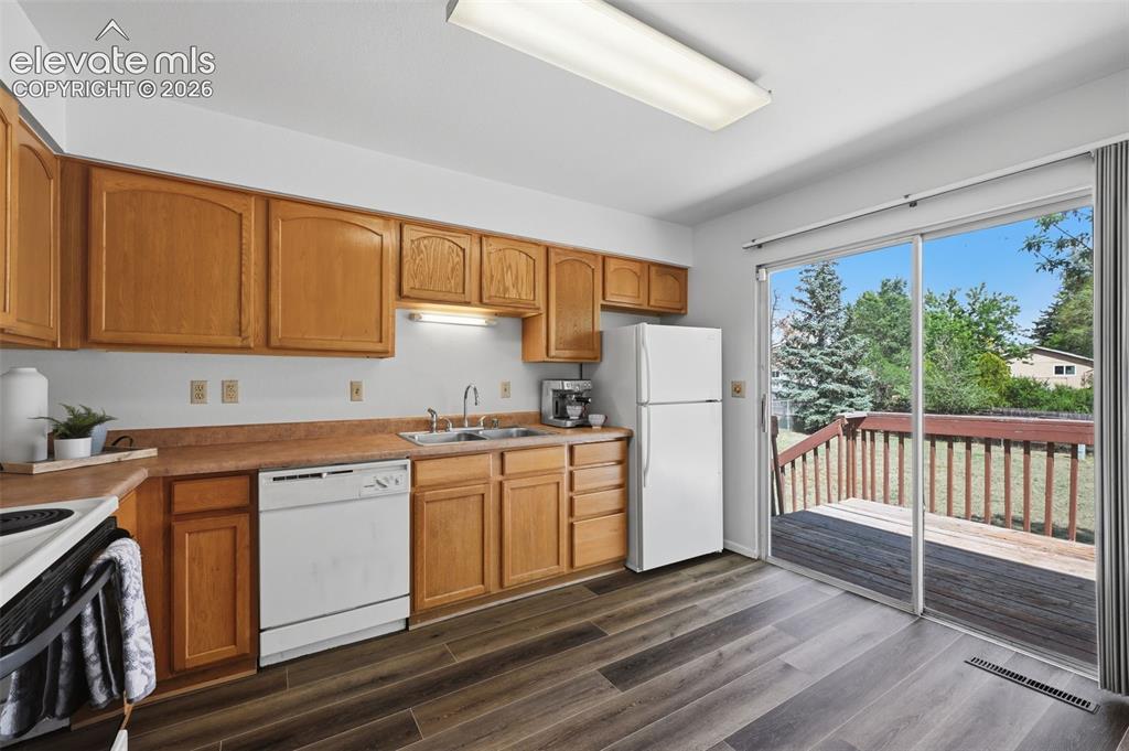 Image 11 of 35: Walk out to the back deck