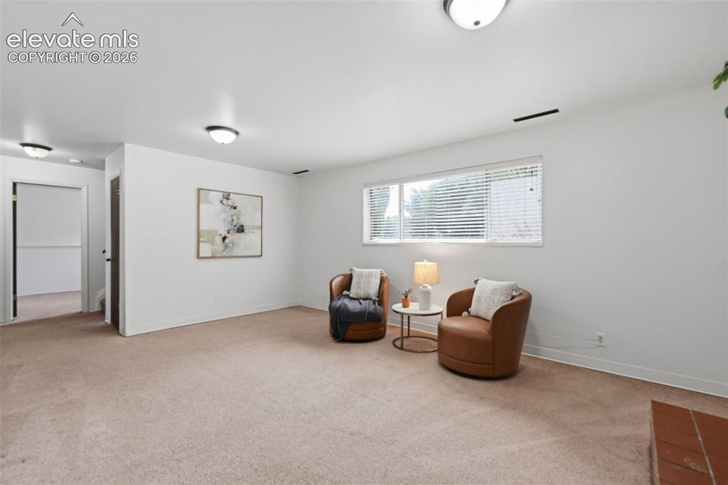 Image 19 of 35: Large room with tons of natural light