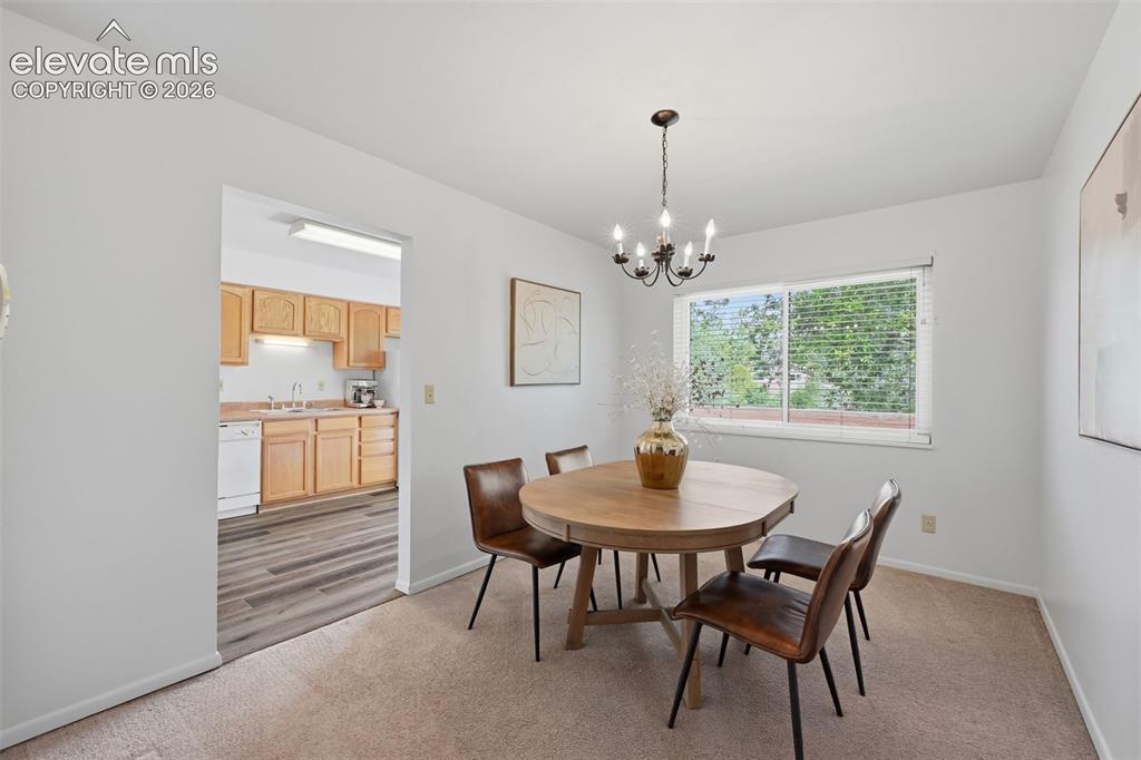 Image 8 of 35: Dining room opens to kitchen