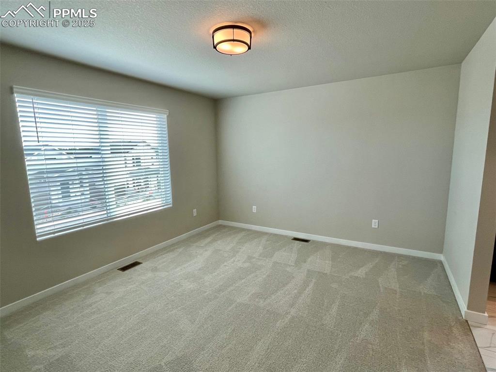 Image 16 of 29: Master Bedroom