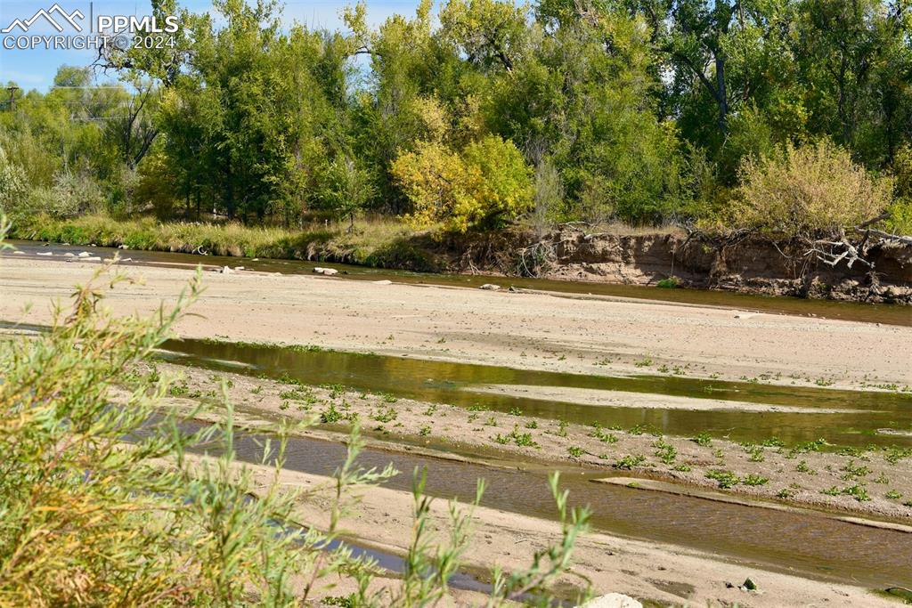 Image 6 of 20: View of yard featuring a water view