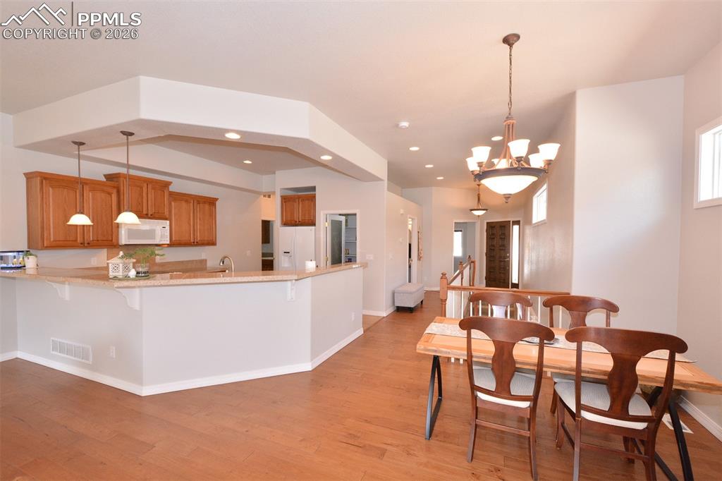 Image 14 of 50: Kitchen/Dining area