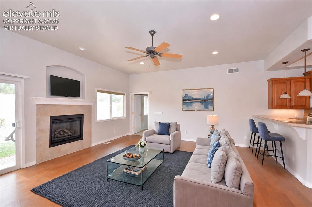 Image 14 of 33: Virtually staged family room