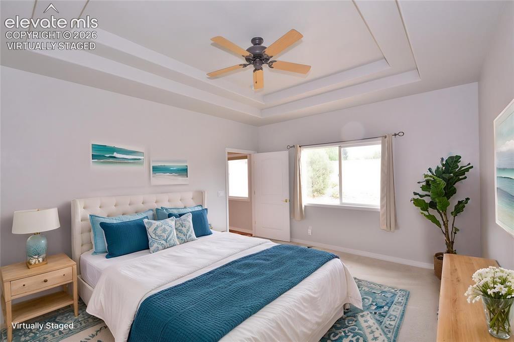Image 16 of 33: virtually staged primary bedroom