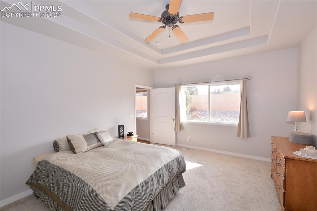 Image 19 of 50: Primary bedroom on main level